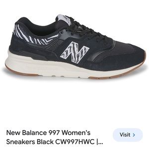 New Balance Women's Black Athletic Sneakers with White Zebra Accent